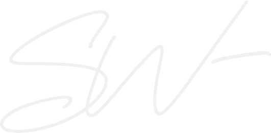 Shannon Wagner "SW" signature in a handwritten script font